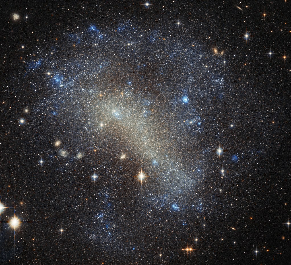 1024px-A_frenzy_of_stars_IC_4710
